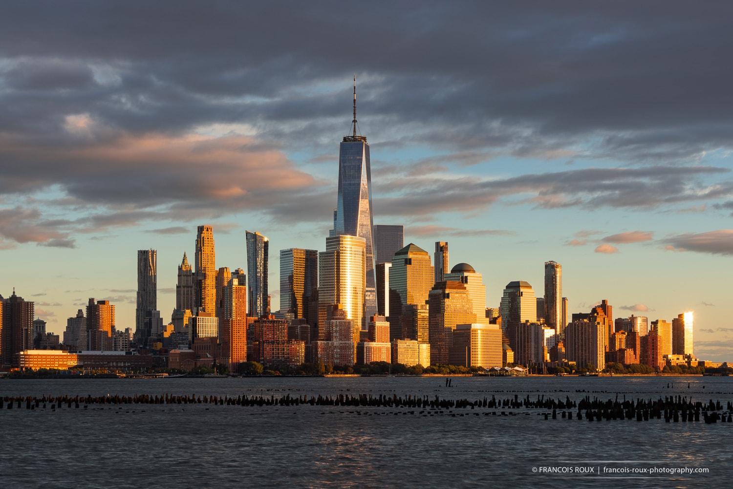 New York City skyline at sunset with World Trade Center skyscrapers